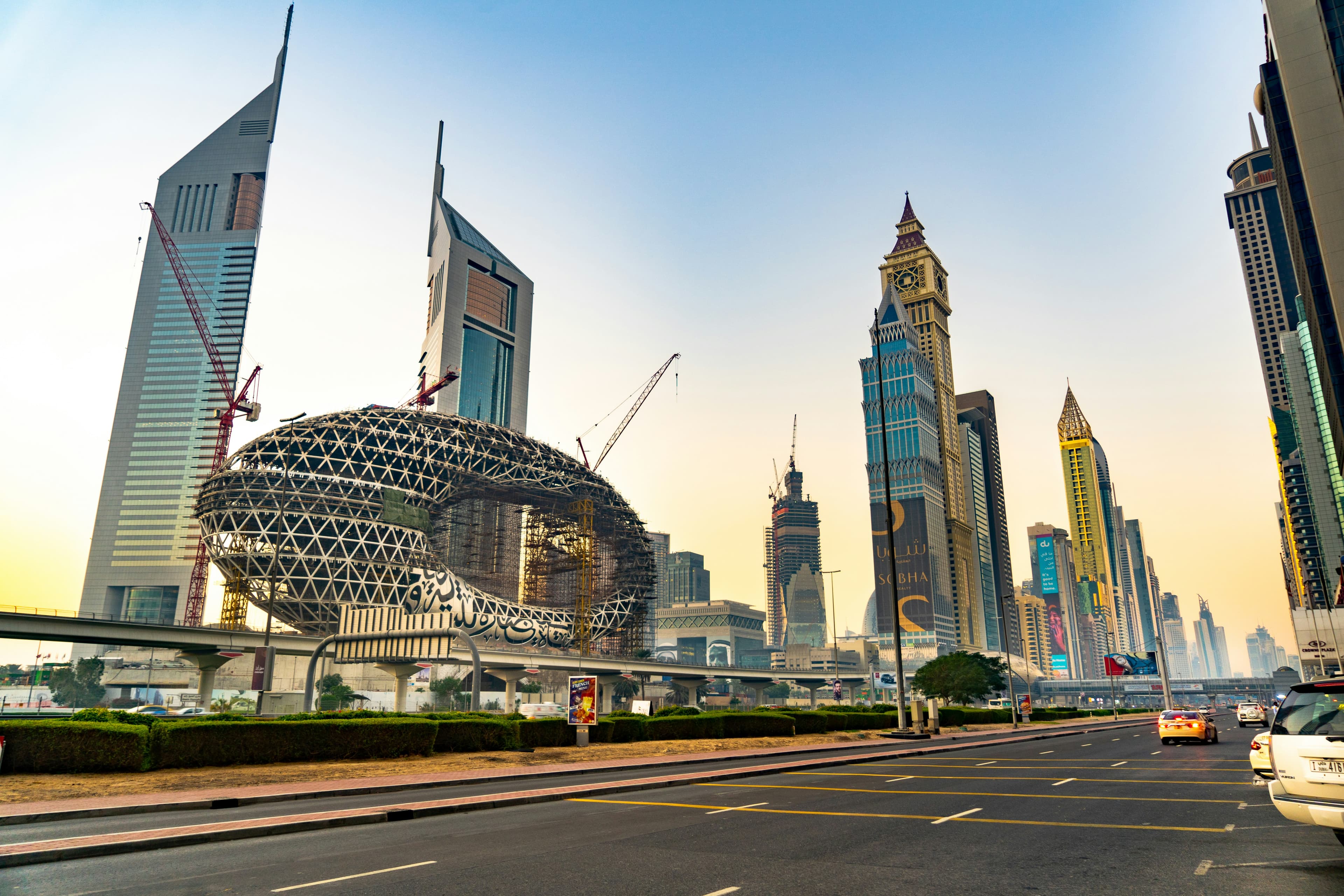 Ultra-modern corporate boardroom overlooking Dubai skyline at dusk